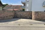 Mur en pierre remis en état pour garder une trace de l'histoire à Issenheim (68)
